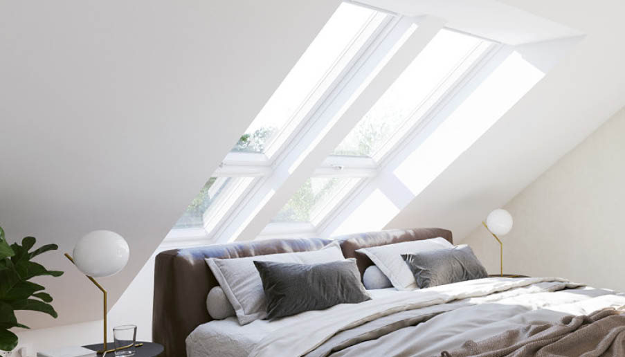 Ett sovrum med takfönster från Velux.